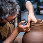 Doug Fitch and Hannah McAndrew making a jug for me